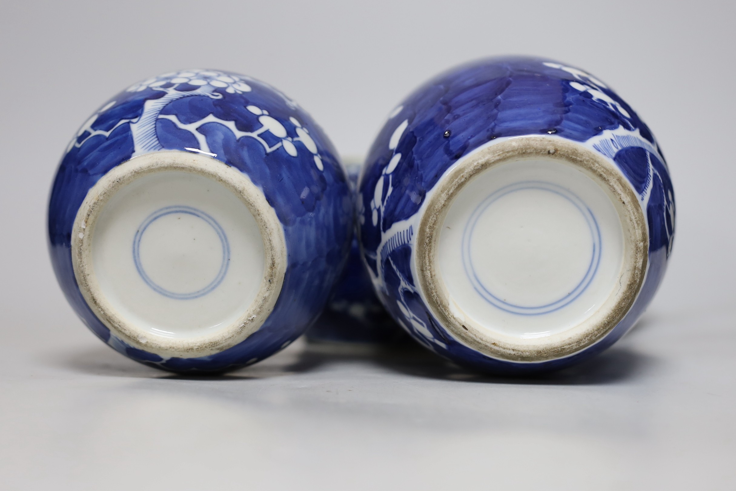 Four Chinese blue and white ‘prunus’ jars, tallest 14cms high